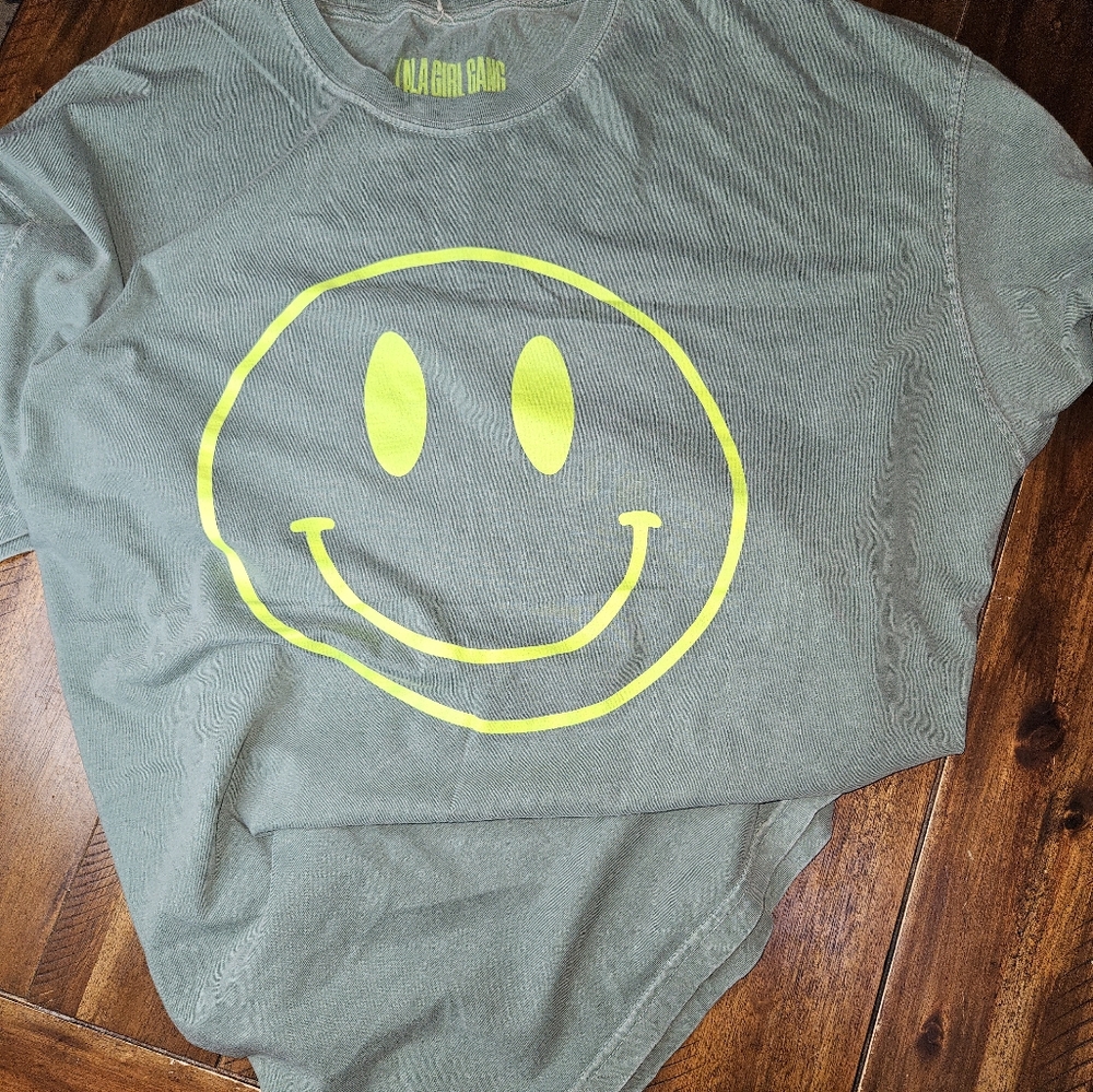Dressed in Lala the world needs your magic t-shirt oversized